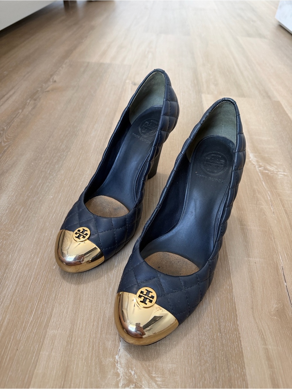 Tory Burch Navy Quilted Leather Heels with Gold Cap Toe Logo